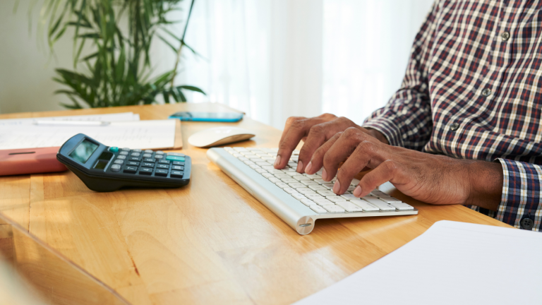 Person using the best accounting software in tanzania